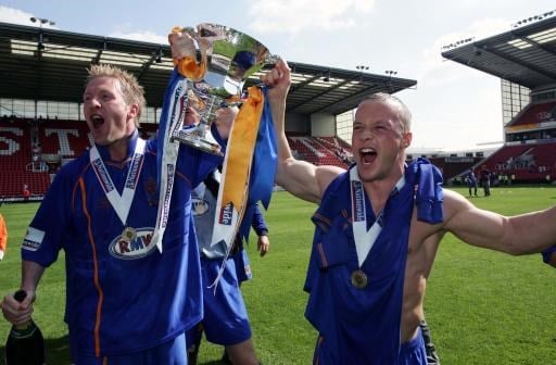 Shrewsbury Town won the Conference play-off final against Aldershot Town to return to the Football League in 2004